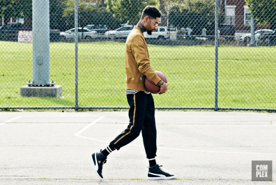 PnB Rock con las zapatillas PUMA Clyde Mid-Foil