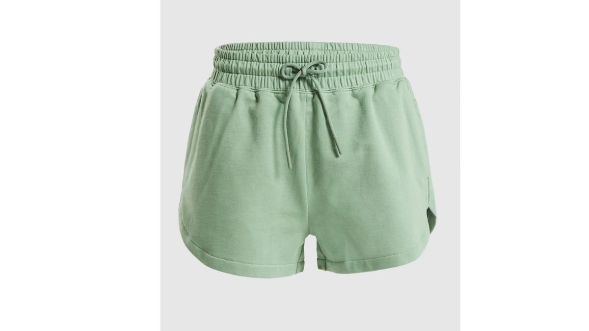 Fitness šortky Gymshark Legacy v pistáciovej zelenej farbe.