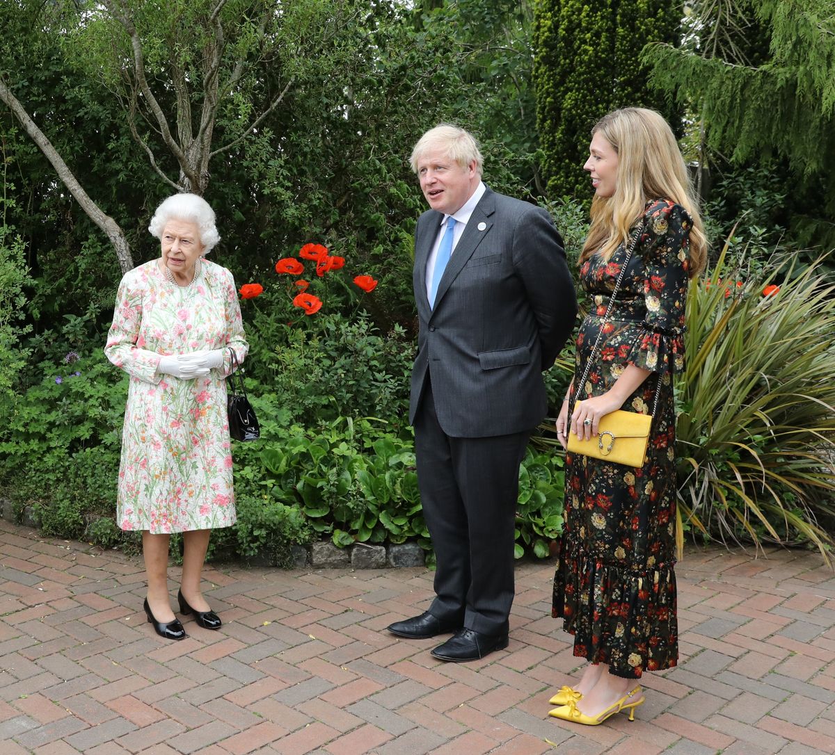 ST AUSTELL, Anglicko - 11. JÚNA: Princ Charles, princ z Walesu, Camilla, vojvodkyňa z Cornwallu, kráľovná Alžbeta II., Princ William, vojvoda z Cambridge, Catherine, vojvodkyňa z Cambridge, britský premiér Boris Johnson a manželka Carrie Johnson prichádzajú na pije recepciu pre lídrov kráľovnej Alžbety II a G7 v projekte The Eden Project počas samitu G7 11. júna 2021 v St Austell, Cornwall, Anglicko. Britský premiér Boris Johnson hostí na samite G7 lídrov z USA, Japonska, Nemecka, Francúzska, Talianska a Kanady. Tento rok Spojené kráľovstvo pozvalo Indiu, Južnú Afriku a Južnú Kóreu, aby sa zúčastnili lídrov